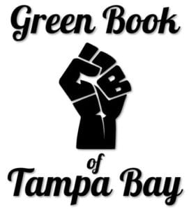 Green Book wording fist on white